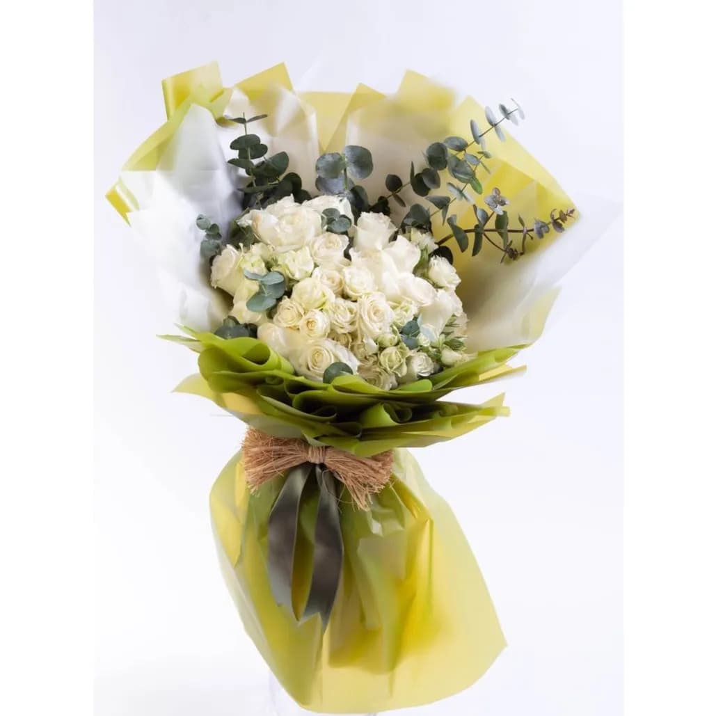 Hand Bouquet With White Roses And Baby Roses