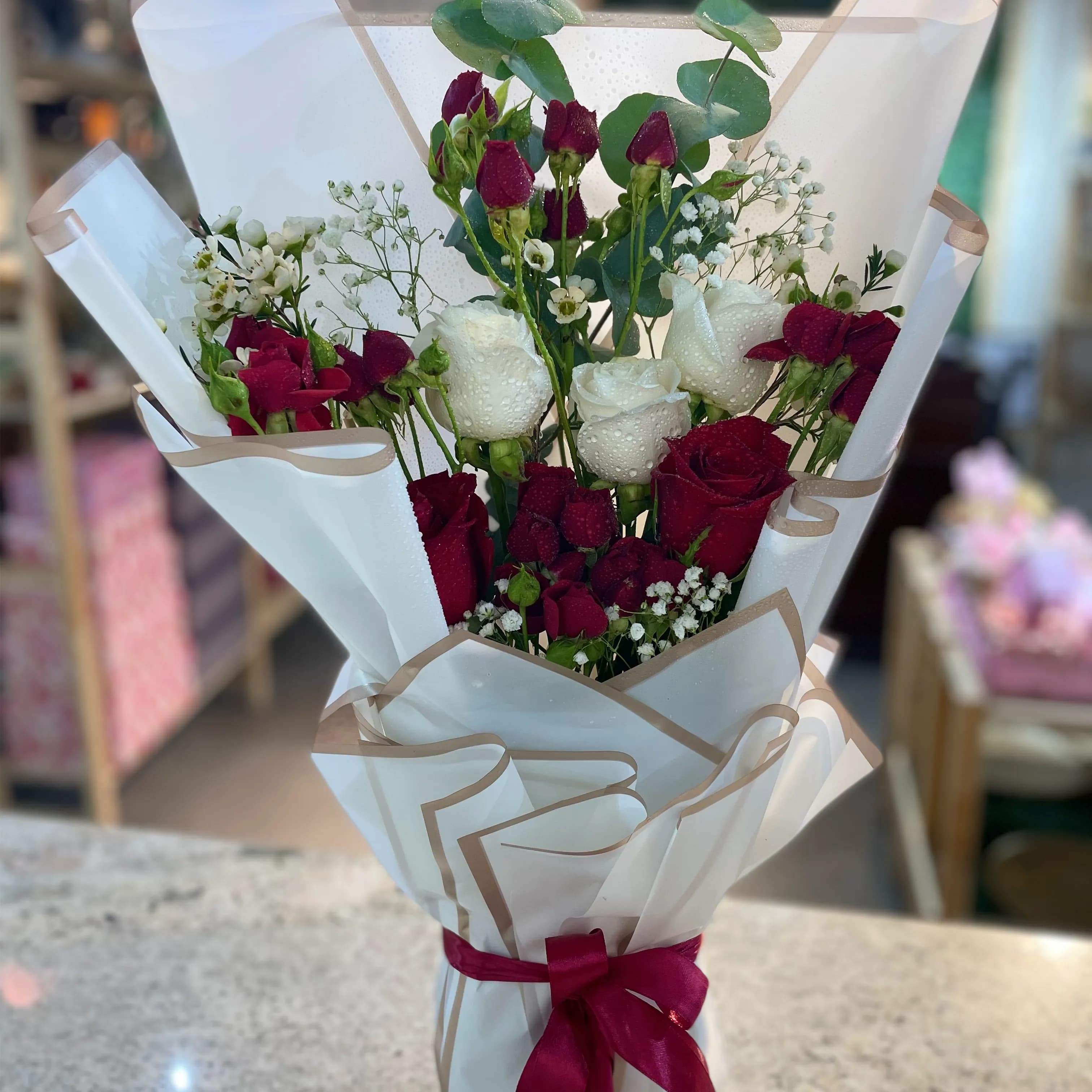 Flap Bouquet With White And Red Rose And Eucalyptus