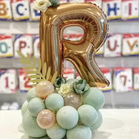 Letter Foil Balloon With Balloon And Artificial Flowers