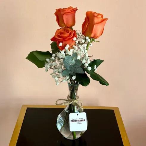 3 Orange Roses In A Vase