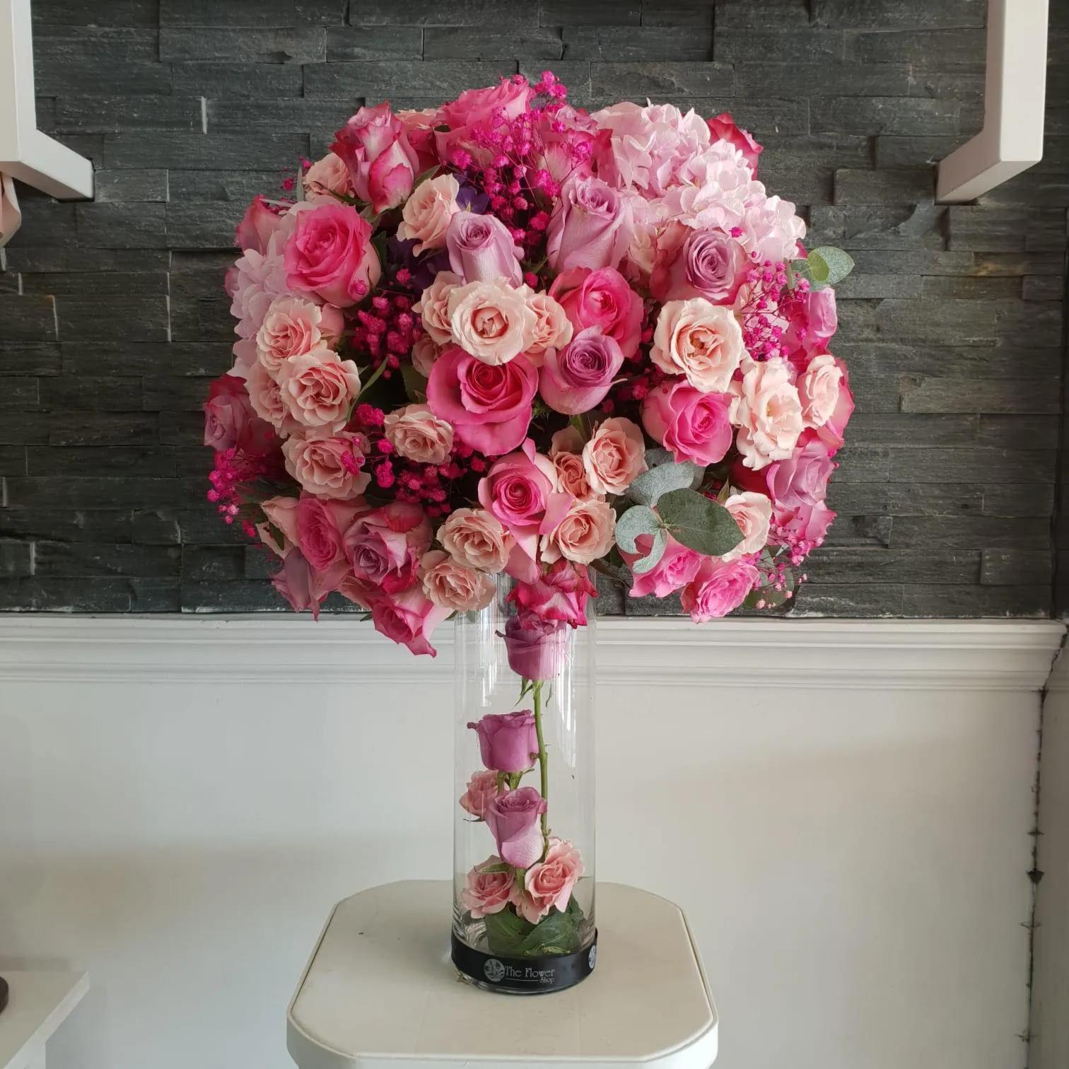 Vase With Pink And Purple Roses